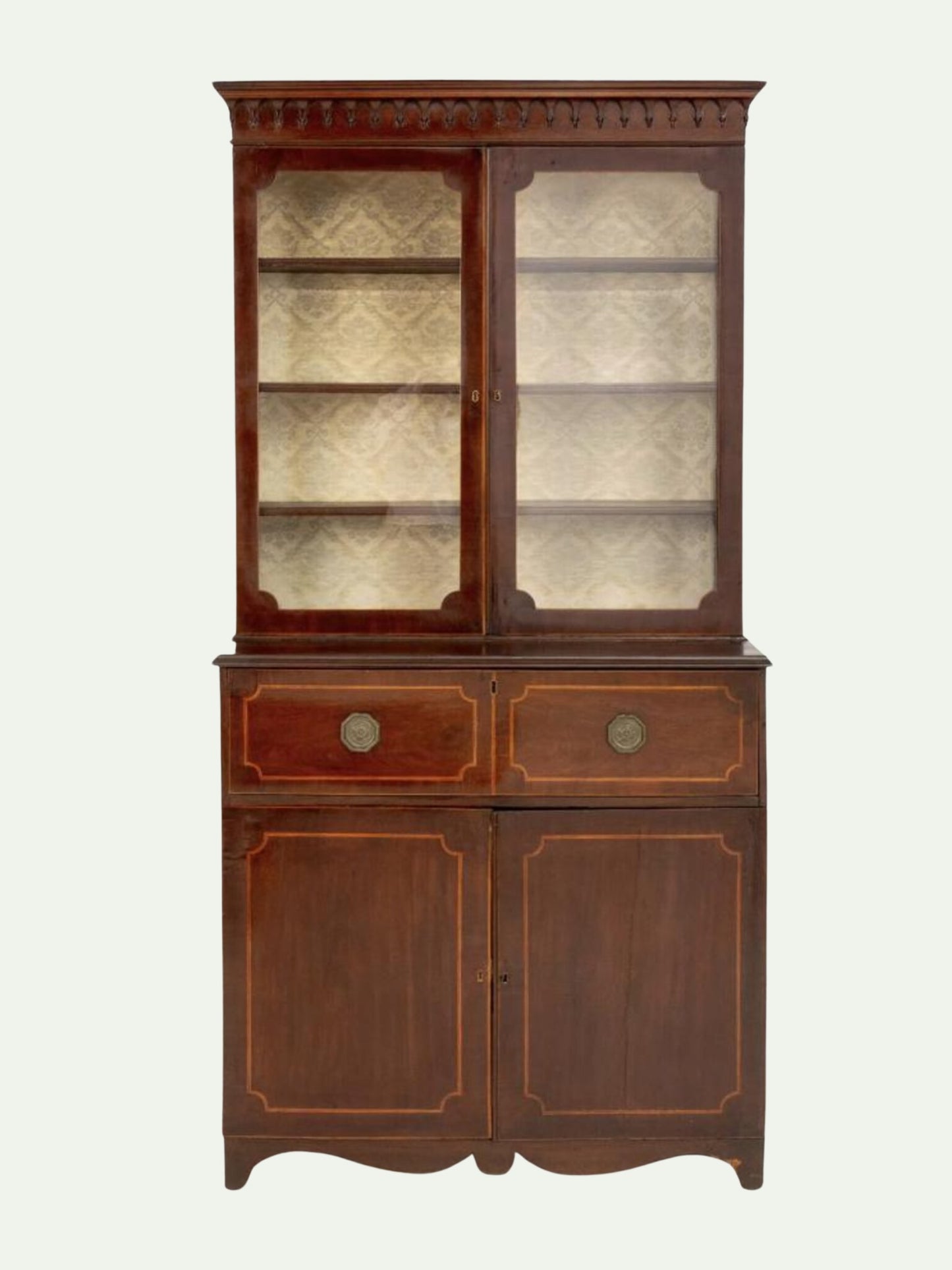 Front view of a wooden dresser with glass doors
