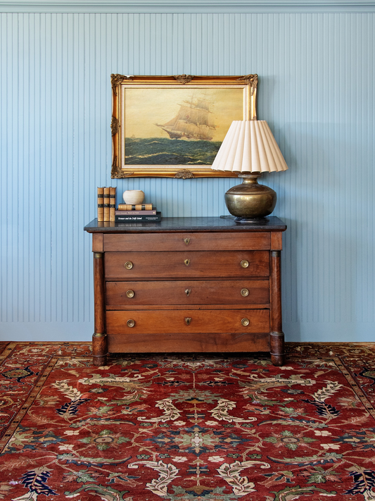 mahogany dresser with black marble top