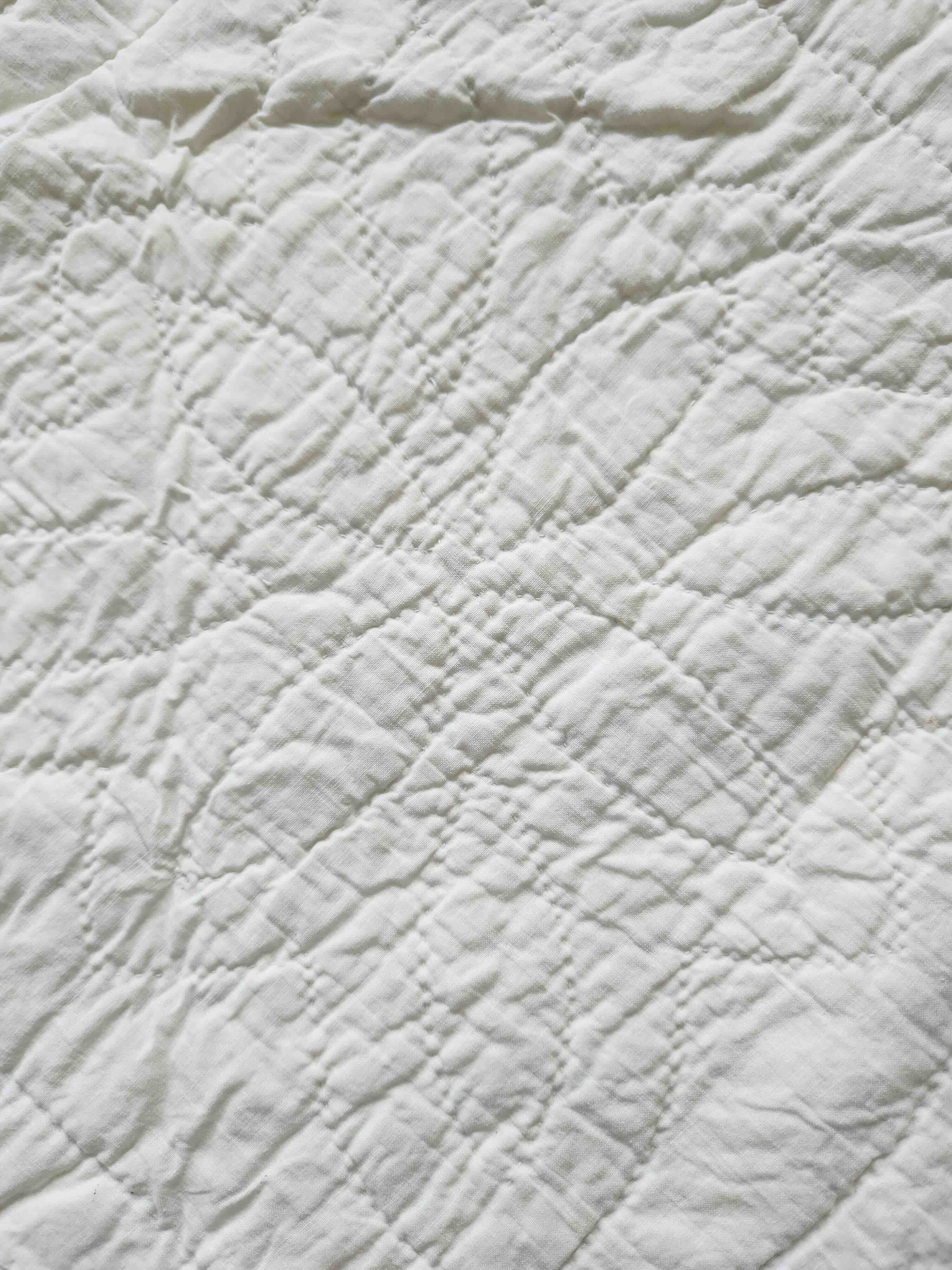 Close-up of textured white fabric