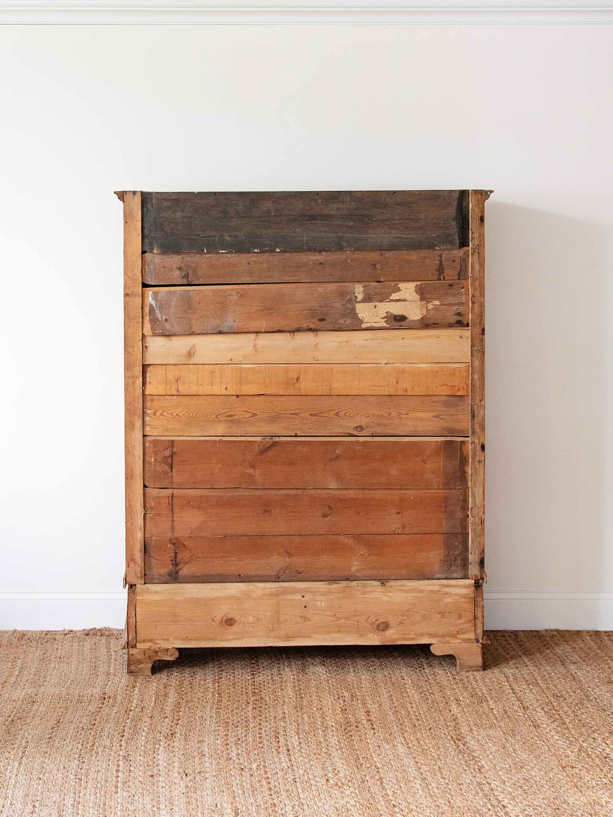 back of a rustic wood pine dresser