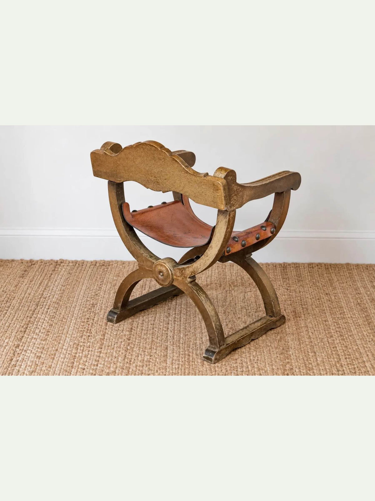 Antique Spanish Renaissance Revival Dante Chair with Carved Heraldic Crest & Leather Sling Seat
