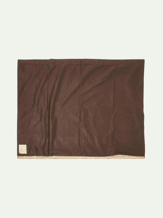 Brown blanket with a beige border on a white background