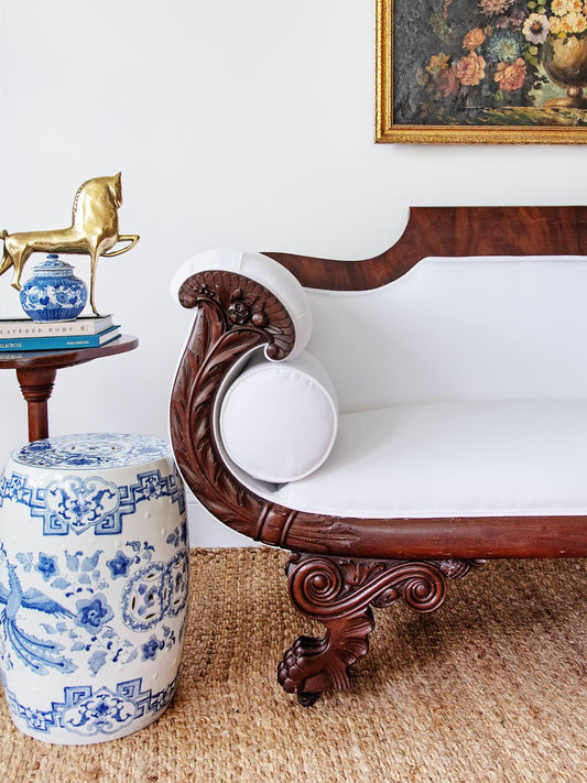 Antique Carved Mahogany Sofa with Crisp White Upholstery