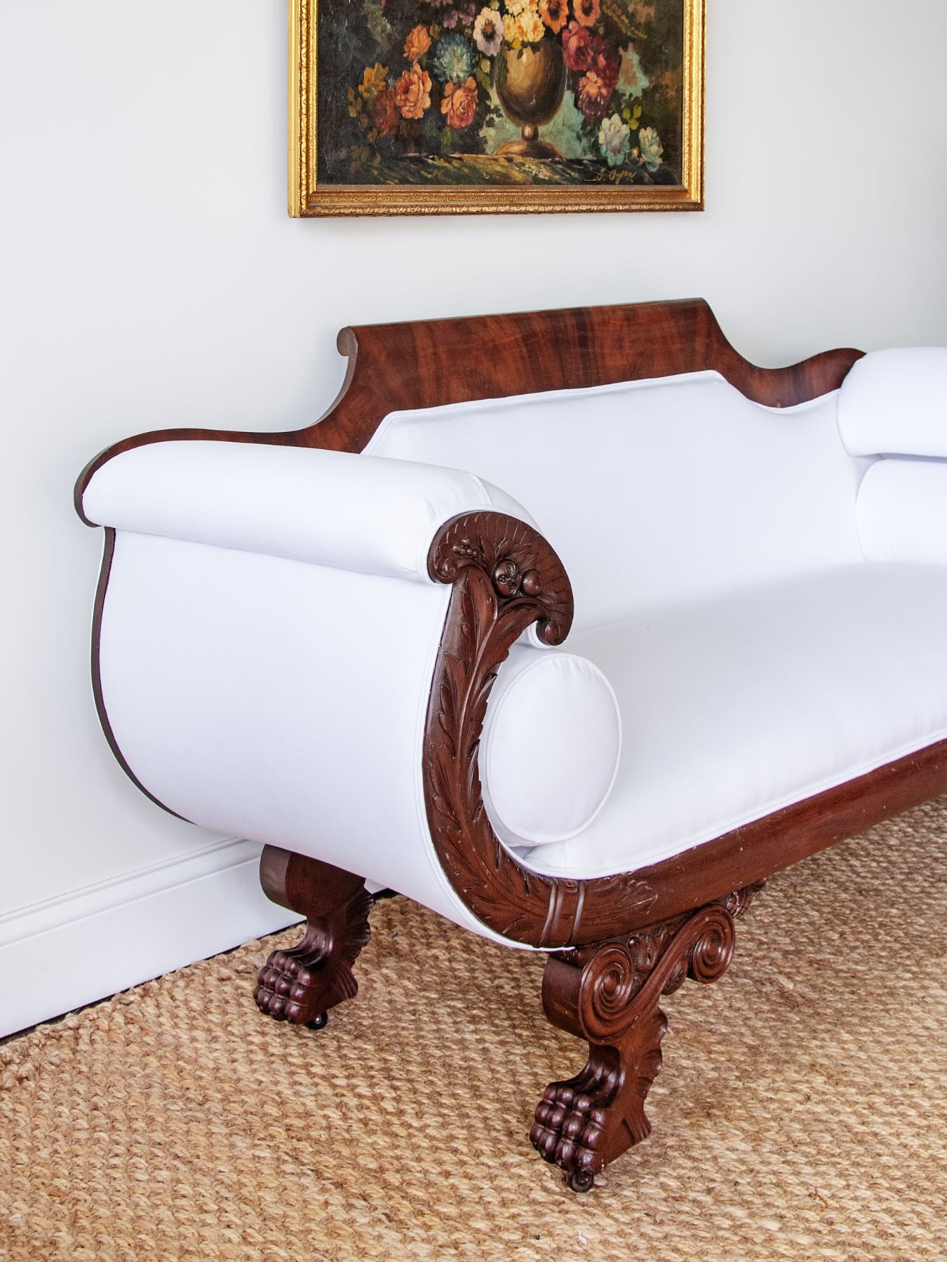 Antique Carved Mahogany Sofa with Crisp White Upholstery