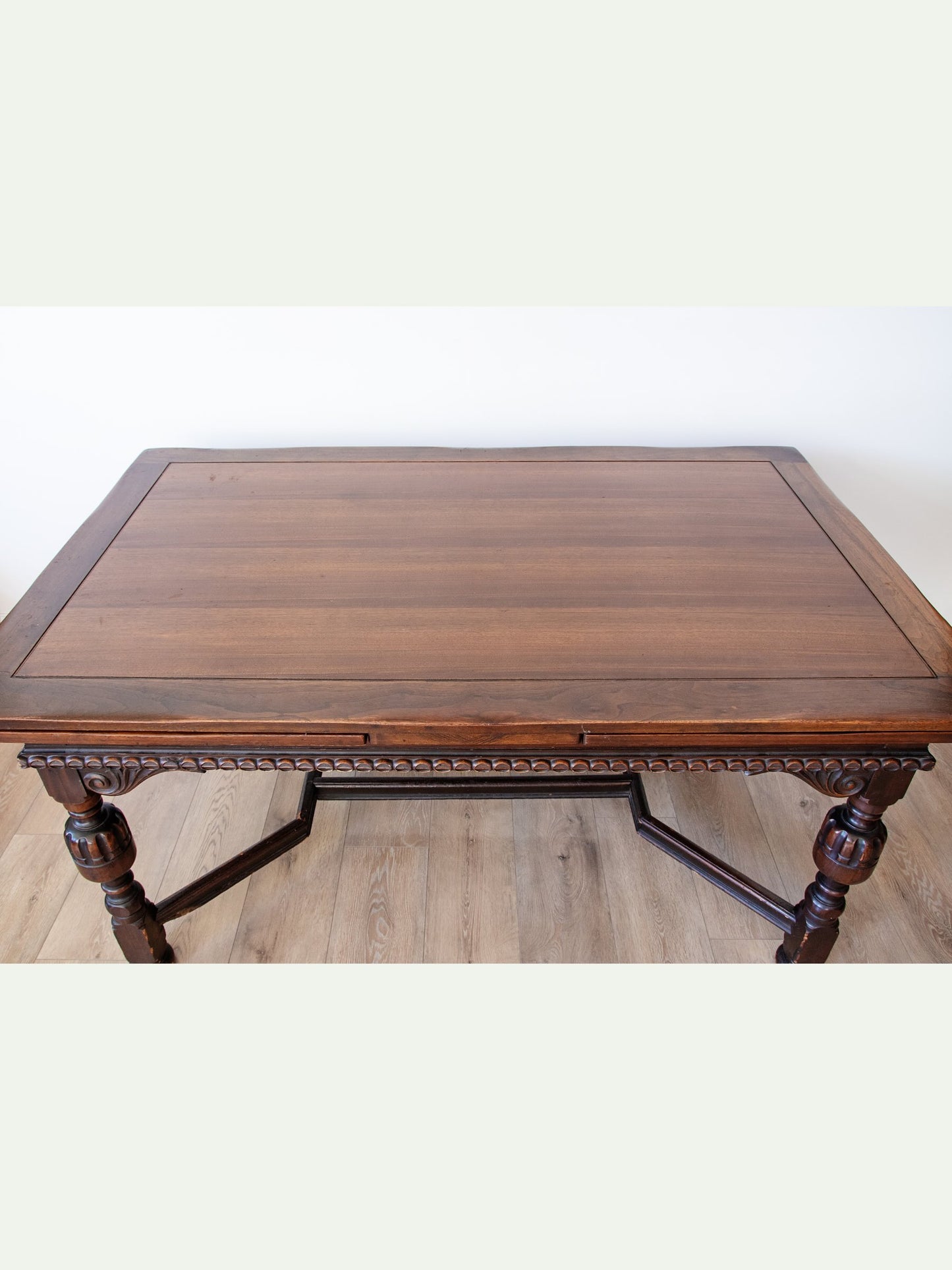Exceptional Berkey & Gay Extendable Walnut Draw-Leaf Dining Table | c. 1925