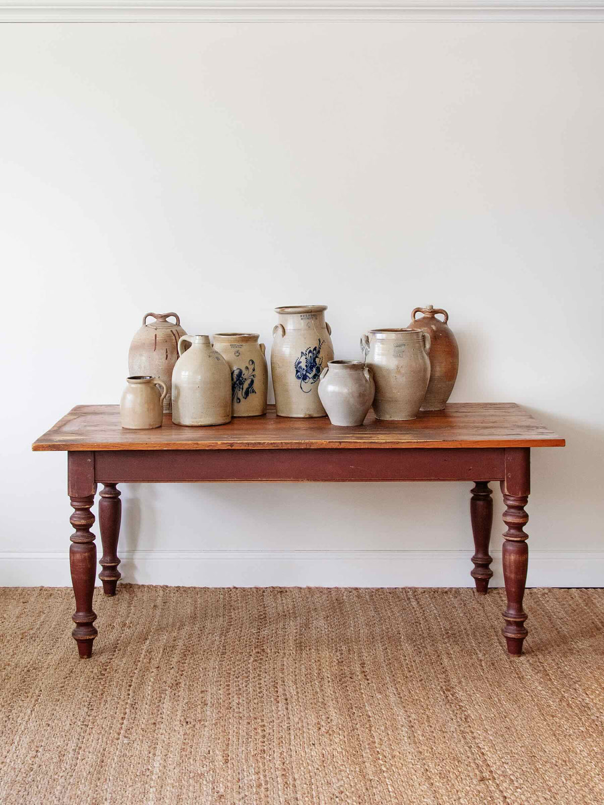 antique pine table with jars on top