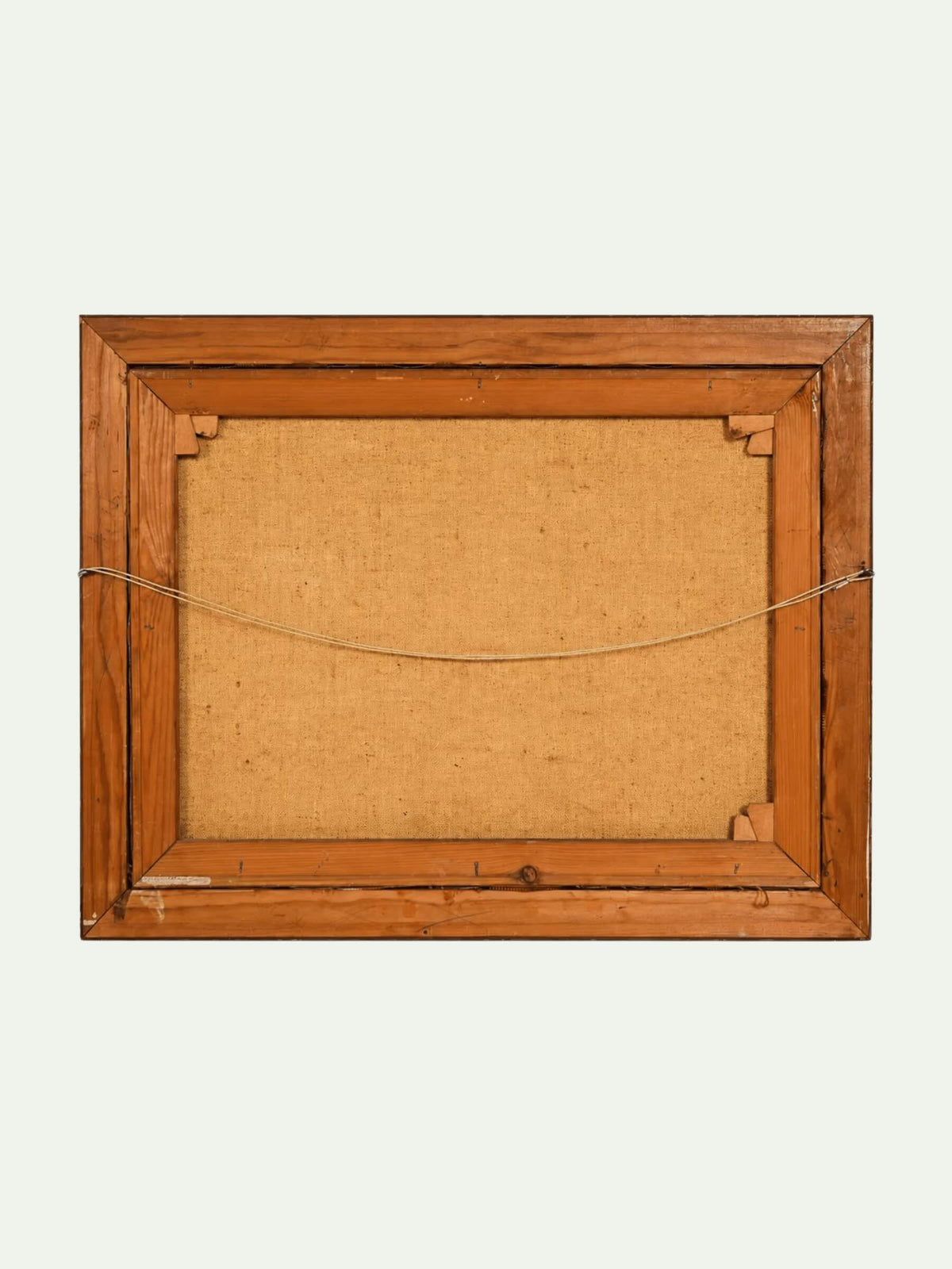back of painting with wooden frame