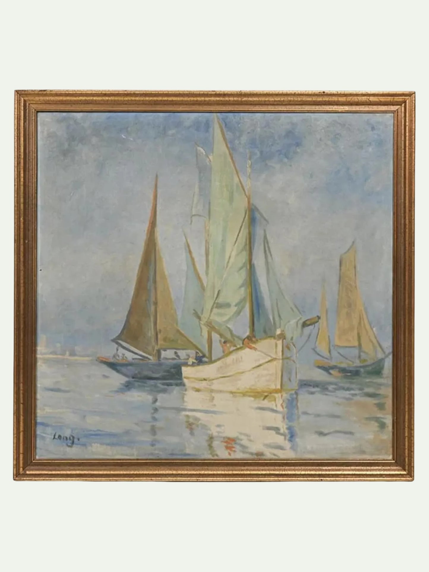 A framed impressionist oil painting depicting sailboats on a calm blue-gray sea under a cloudy sky, enclosed in a gold-toned wooden frame.