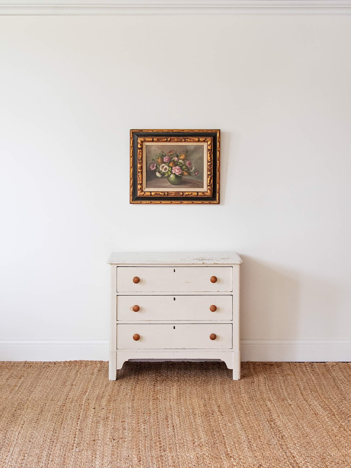 white chest of drawers with three drawers