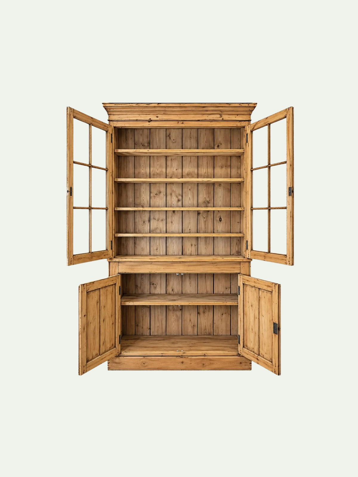 A rustic wooden bookcase with open doors and glass-paneled side doors, showing multiple interior shelves, isolated on a light off-white background.