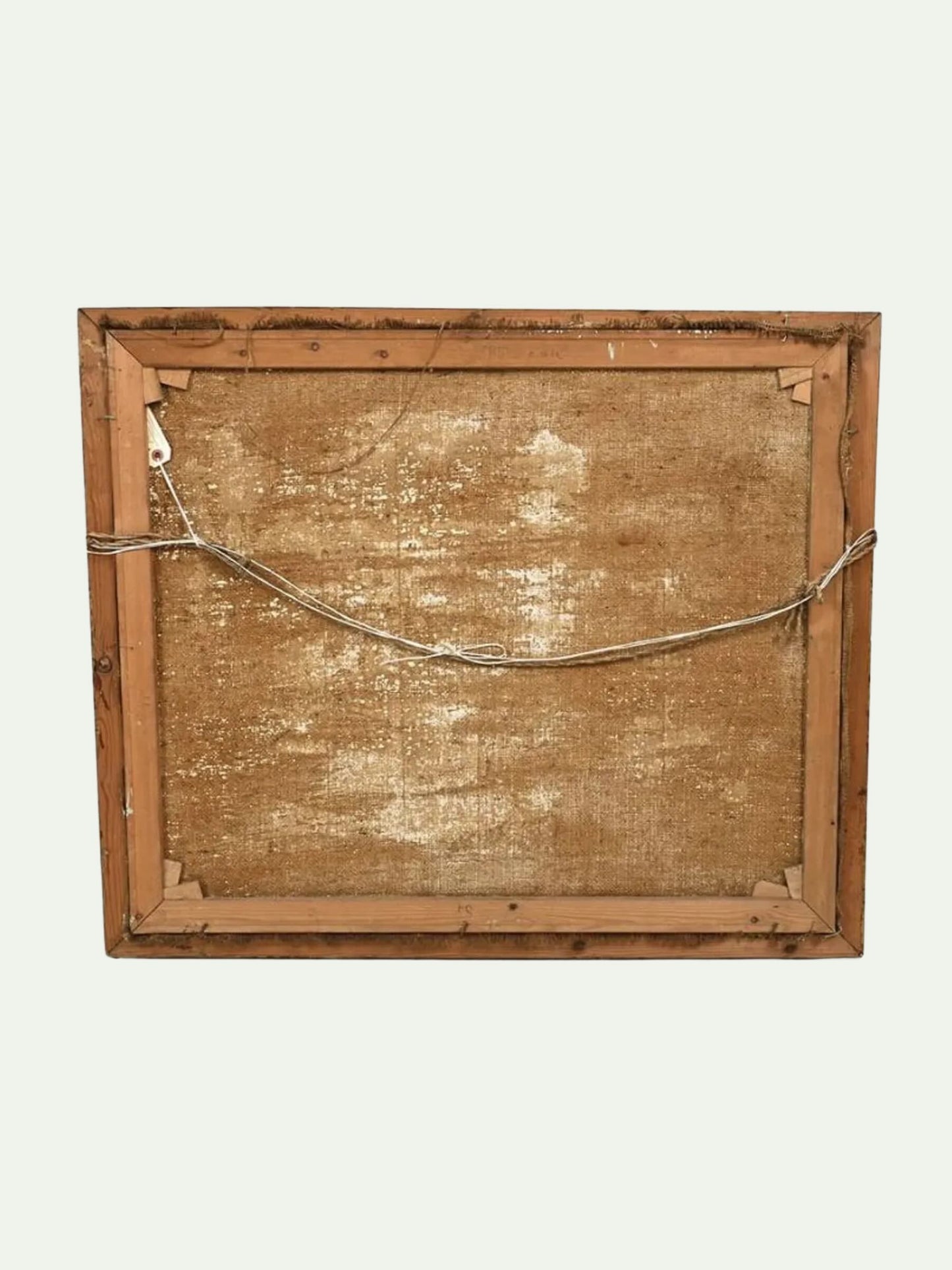 The back view of a rustic wooden framed canvas or print, showing the textured brown backing board and metal hanging wire against a light off-white background.
