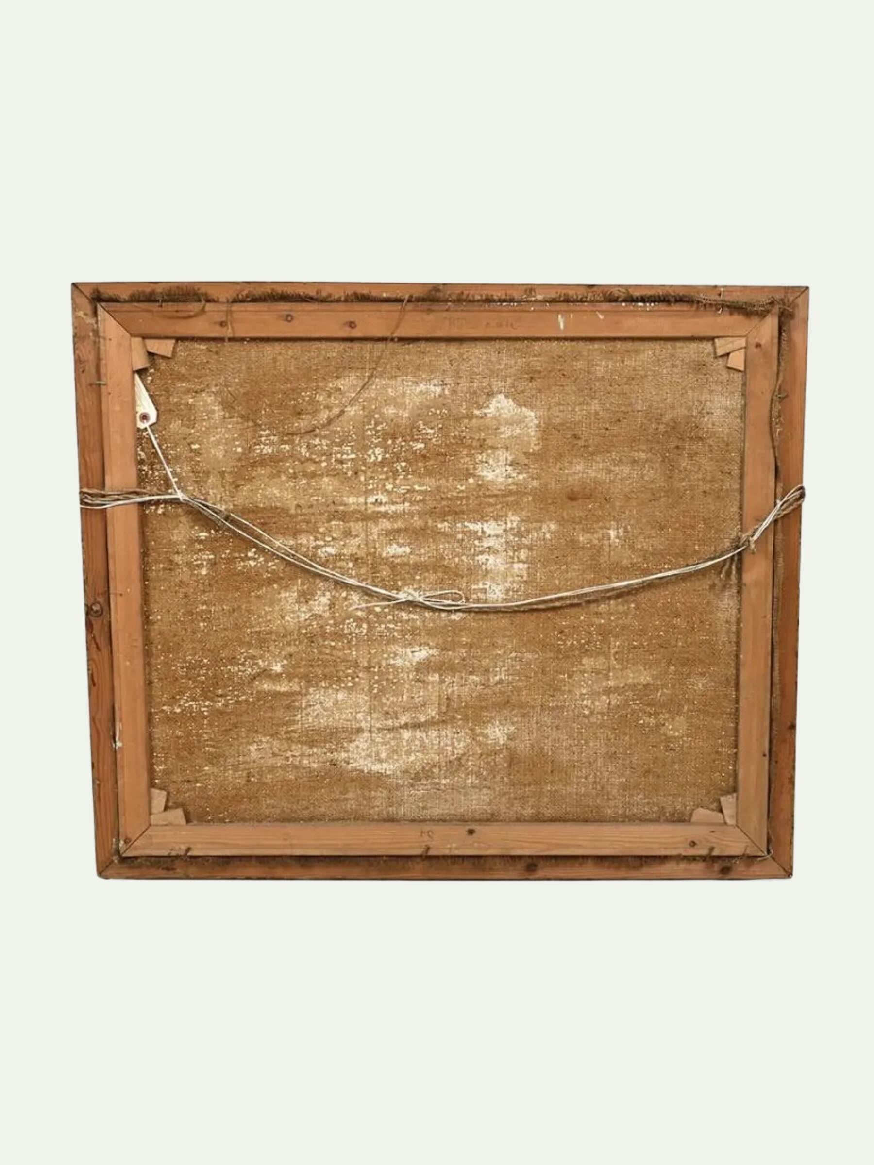 The back view of a rustic wooden framed canvas or print, showing the textured brown backing board and metal hanging wire against a light off-white background.
