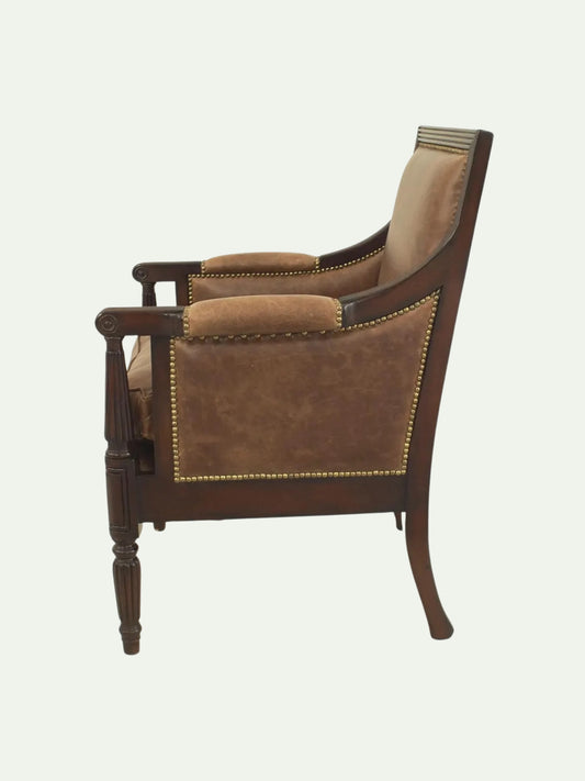 Brown armchair with leather and wooden frame on a white background