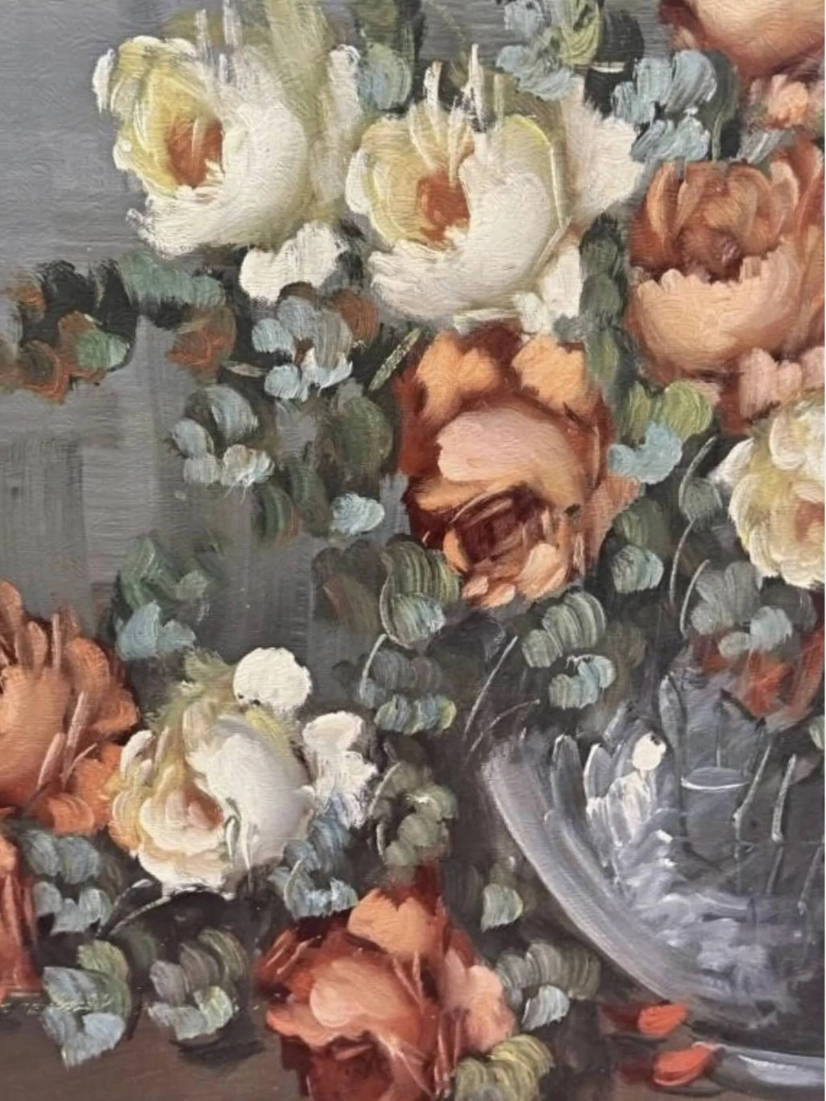 Impressionist-style floral painting showing a bouquet of cream, peach, and rust roses with green and blue-gray leaves, arranged in a reflective gray vase against a muted gray background.